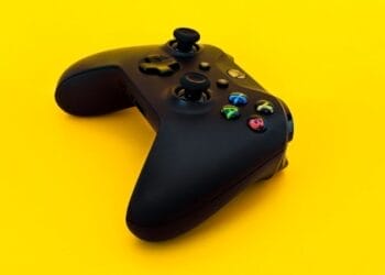 black xbox one game controller - Natural light outside studio. Infinity curve made out of scrap paper found around the house. Natural light at about 9AM in the morning with clear skies., tags: des de - unsplash