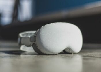 a close up of a pair of ear cushions - Apple Vision Pro headset on a concrete floor, tags: la faille de sécurité casque d'apple - unsplash